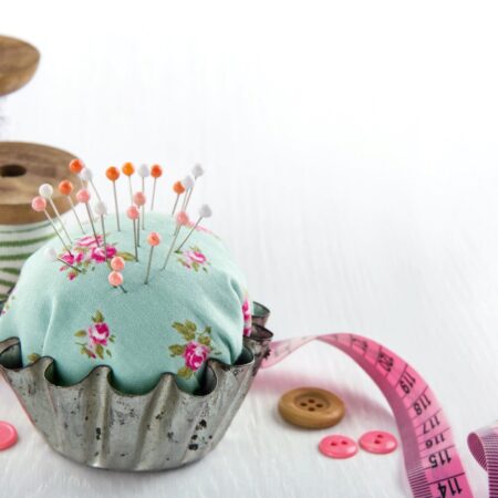 Pincushion in an antique metal cupcake Sewing Alteration Supplies