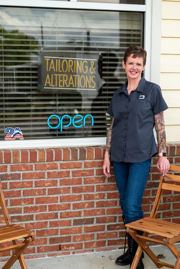 Sew Fabulous Tailoring and Alterations Sign with Owner
